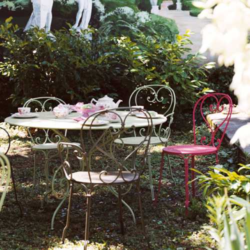 Comedor de jardin con mesa redonda y 6 sillas de acero forjado