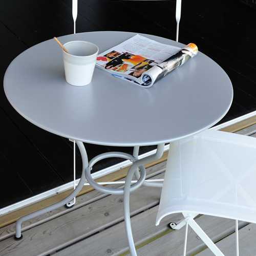 Cubierta de una mesa Opera para exterior redonda en color blanco