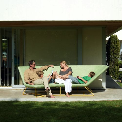 Sofa curvo Ultrasofa diseño de Frédéric Sofia para Fermob en color verde